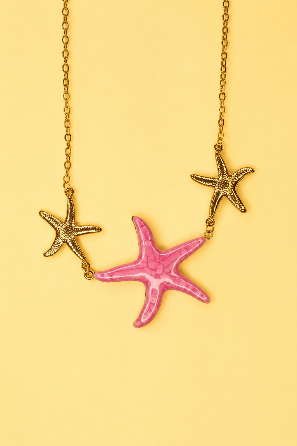 Colgante estrella rosa